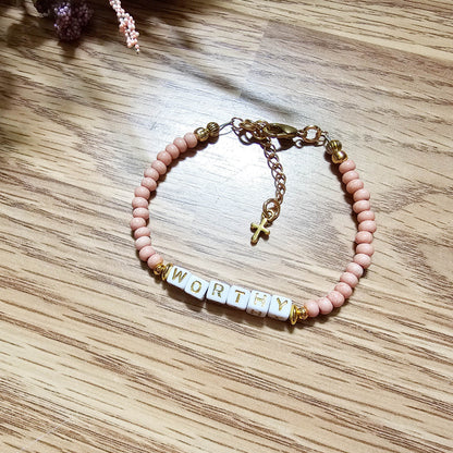 Pink and Gold Single Strand Word bracelet