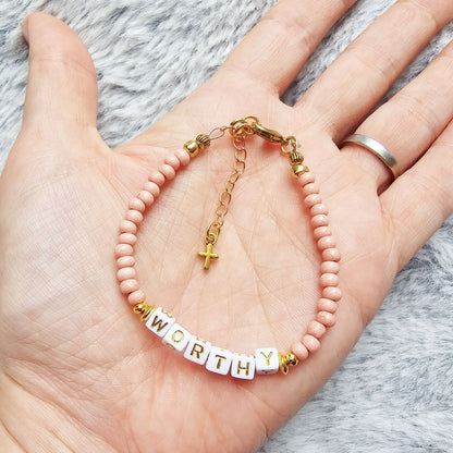 Pink and Gold Single Strand Word bracelet